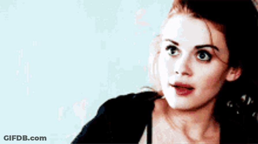 Holland Roden Eyes Rolled Taking Off Clothes GIF