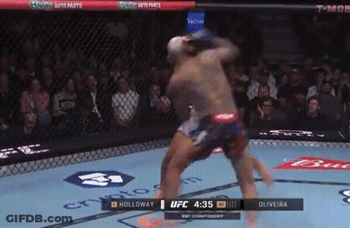 Holloway And Oliveira Fighting In UFC Ring GIF