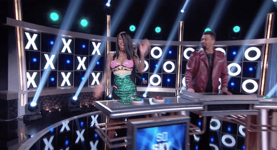 Hollywood Squares Girl Player Waives Audience GIF