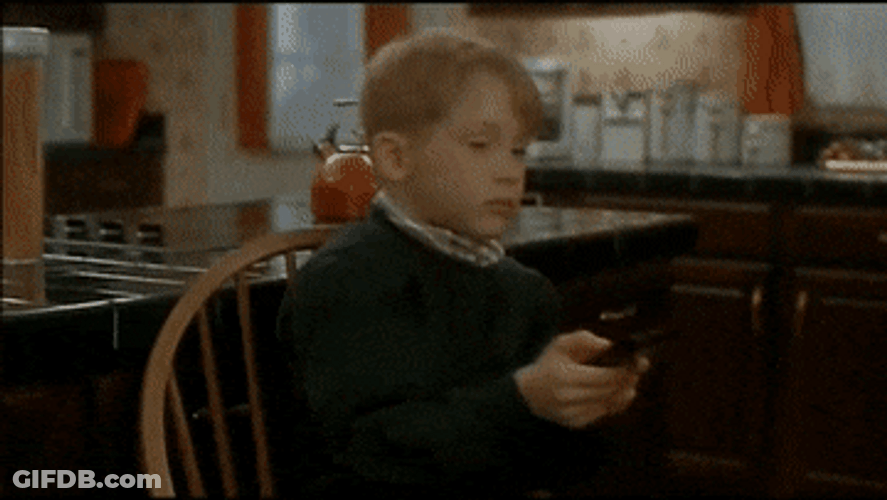 Home Alone Kevin Using Tv Remote GIF