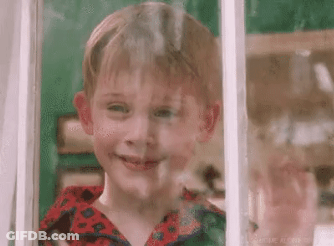 Home Alone Kevin Waves At The Window GIF