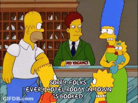 Homer And Marge Simpson In Front Of No Vacancy Sign GIF