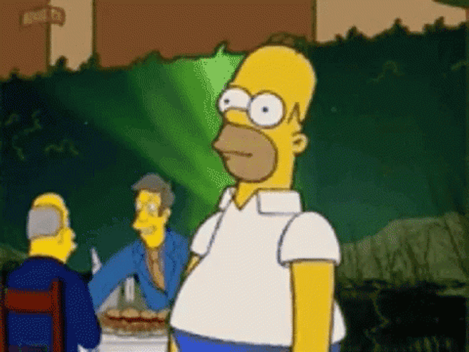 Homer Disappearing On The Green Grass GIF