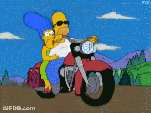 Homer Simpson And Marge Simpson Are Riding A Motorcycle Together GIF