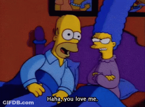 Homer Simpson And Marge Simpson Are Sitting On A Bed And Talking GIF