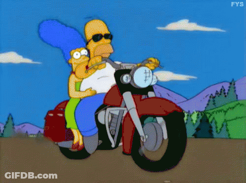 Homer Simpson And Marge Simpson Riding A Motorcycle GIF