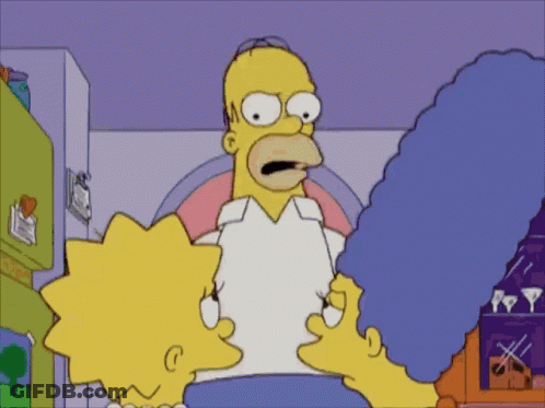 Homer Simpson And Marjorie Simpson Standing Together GIF