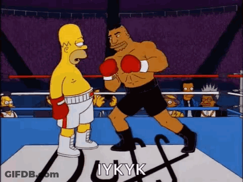 Homer Simpson And Mike Tyson Are Boxing In A Ring . GIF