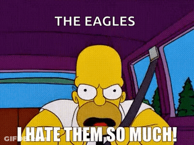 Homer Simpson From The Simpsons Is Driving A Car And Saying `` I Hate Them So Much '' . GIF
