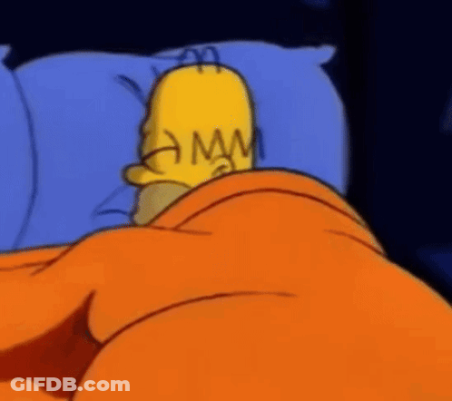 Homer Simpson From The Simpsons Is Laying In Bed GIF