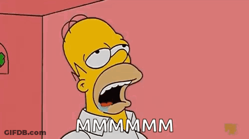Homer Simpson From The Simpsons Is Screaming With His Mouth Open And The Words Mmmmm Written Below Him GIF