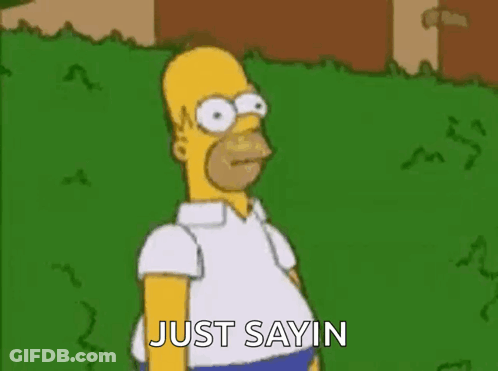 Homer Simpson From The Simpsons Is Standing In The Grass And Saying `` Just Saying '' . GIF