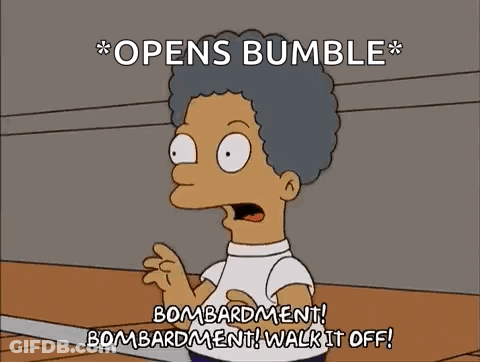 Homer Simpson Holding Boxing Glove And Pointing GIF