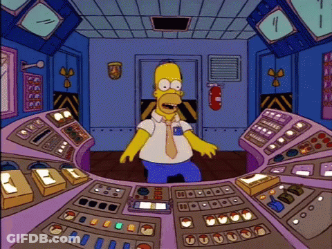 Homer Simpson In Control Room With Fire Extinguisher GIF
