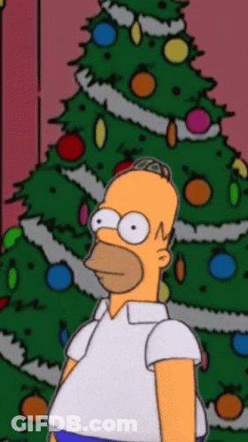Homer Simpson In Front Of Christmas Tree With Decorations GIF