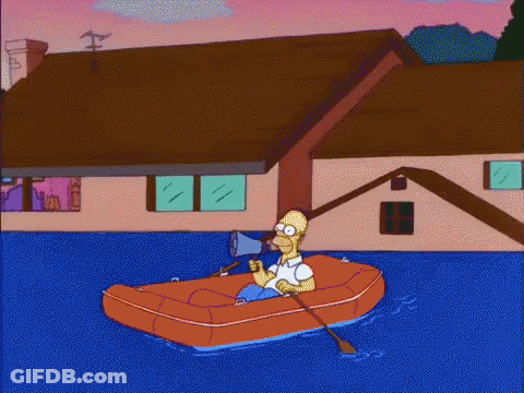 Homer Simpson In Raft With Megaphone In Mouth GIF