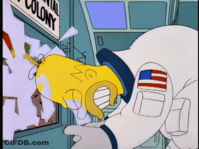Homer Simpson In Space Suit Looking At Colony Sign GIF