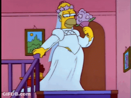 Homer Simpson In Wedding Dress Holding Flowers GIF