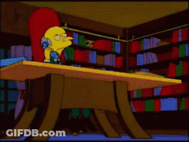 Homer Simpson In White Robe And Headphones GIF