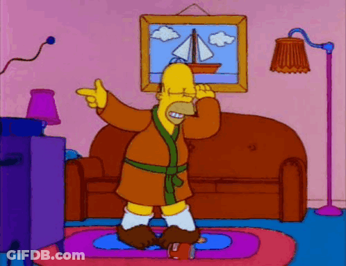 Homer Simpson Is Dancing In A Living Room With A Couch . GIF