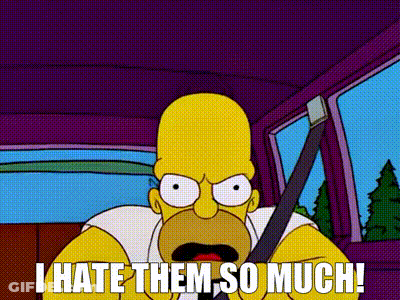 Homer Simpson Is Driving A Car And Saying `` I Hate Them So Much ! '' GIF