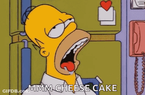 Homer Simpson Is Eating A Cheese Cake In A Cartoon . GIF