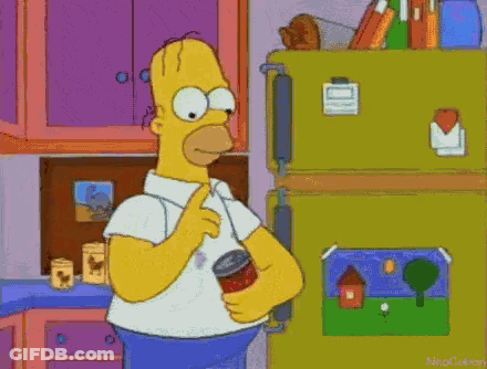 Homer Simpson Is Holding A Can Of Tomato Sauce In His Hand In Front Of A Refrigerator . GIF