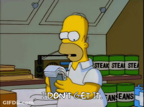 Homer Simpson Is Holding A Stack Of Towels And Saying I Don T Get It GIF
