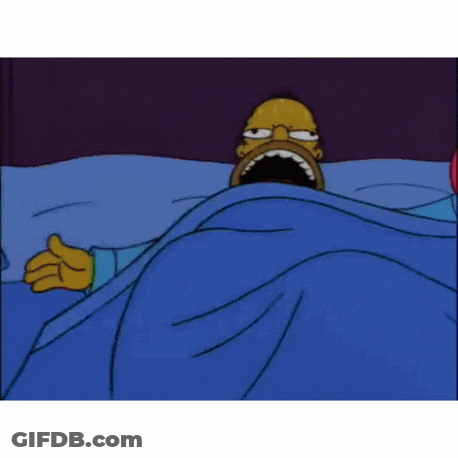 Homer Simpson Is Laying In Bed Under A Blue Blanket . GIF