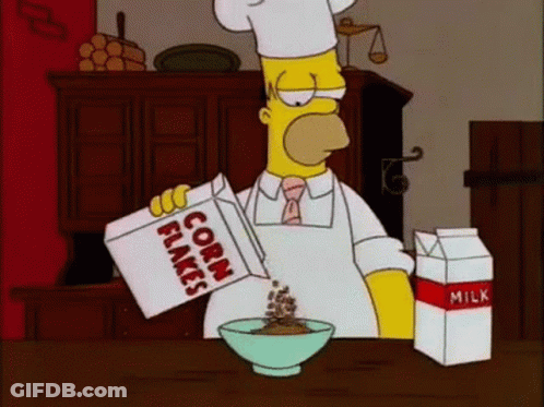 Homer Simpson Is Pouring Corn Flakes Into A Bowl While Wearing A Chef 'S Hat . GIF