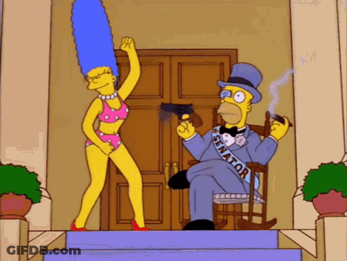 Homer Simpson Sitting In Chair With Sash GIF