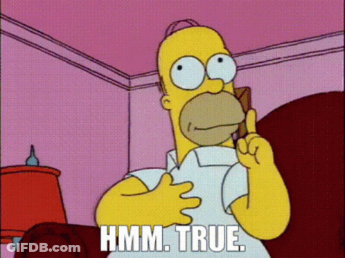 Homer Simpson Is Sitting In A Chair With His Finger Up And The Words Hmm True Below Him GIF