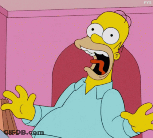 Homer Simpson Is Sitting In A Chair With His Mouth Open GIF