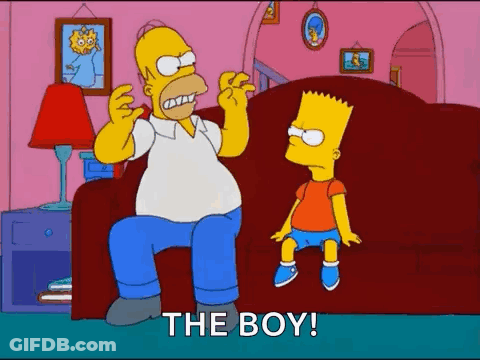 Homer Simpson Is Sitting On A Red Couch Talking To Bart Simpson . GIF