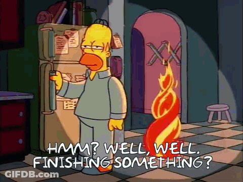 Homer Simpson Is Standing In Front Of A Refrigerator With The Words " Hmm Well Well Finishing Something " Written Below GIF