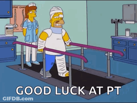 Homer Simpson Is Walking On Parallel Bars In A Hospital While A Nurse Stands Behind Him . GIF