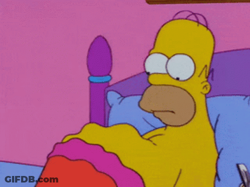 Homer Simpson Laying In A Bed With A Pink Blanket GIF
