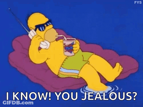 Homer Simpson Laying Talking On Phone Drinking Smoothie GIF