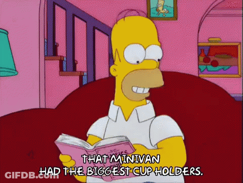 Homer Simpson Reading Book About Minivan Cup Holders GIF