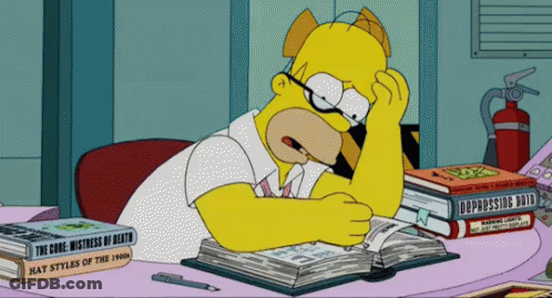 Homer Simpson Sits At A Desk With A Stack Of Books One Of Which Is Titled Depressing Death GIF