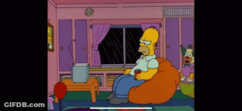 Homer Simpson Sitting In Bean Bag Chair With Soda GIF