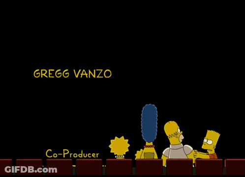 Homer Simpson Sitting In Theater With Animation Co-Producer Craig Sost GIF