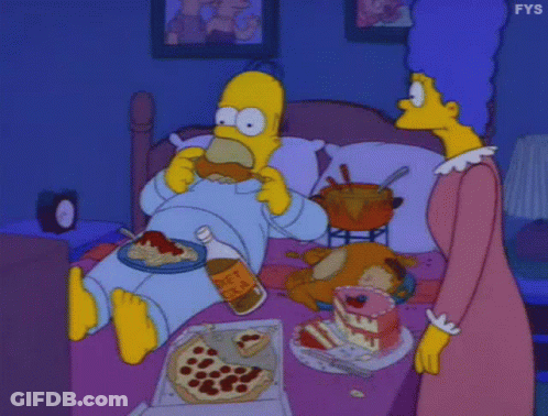 Homer Simpson Sitting On Bed Eating Pizza And Drinking Diet Cola GIF