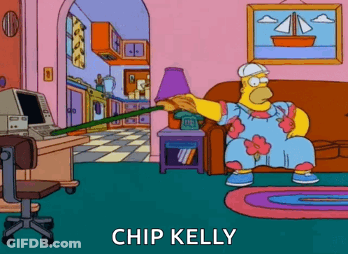 Homer Simpson Sitting On Couch Holding Broom Chip Kelly GIF