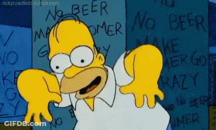 Homer Simpson Standing In Front Of Graffiti Wall GIF