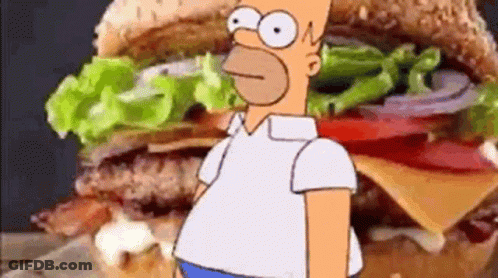 Homer Simpson Standing In Front Of Hamburger GIF