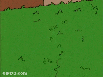 Homer Simpson Standing In Grassy Area GIF