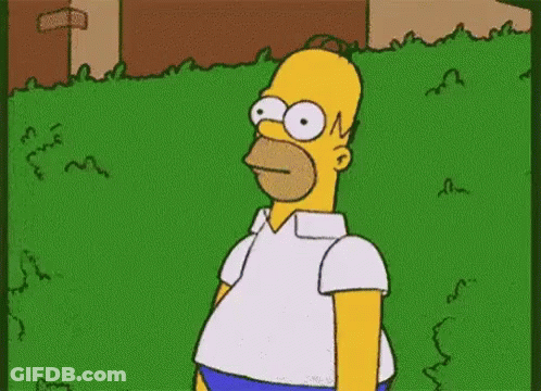 Homer Simpson Standing In Grassy Yard GIF