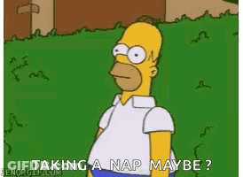 Homer Simpson Taking A Nap In Grass GIF