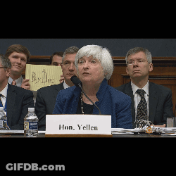 Yellen Sitting At Table With Buy Days Sign GIF